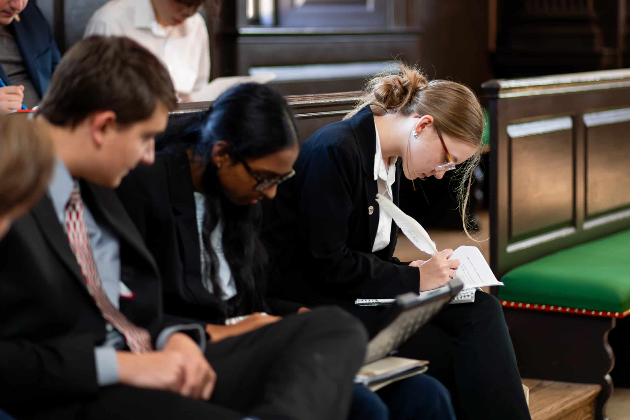 Students prepare their arguments at the Revolutionary Rhetoric speech and debate tournament in Williamsburg, Virginia